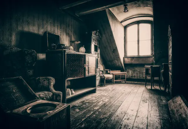 Room full of old furniture before a house clearance in Bristol